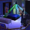 A bedroom in The Sims 2 in an apartment. It's dark except for a green and blue party light. A child Sim in an orange dress is jumping on a single bed. An adult Sim is dressed as a witch playing a synthesiser.