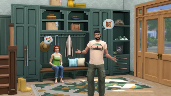 A picture of a man in a mud room shrugging and looking somewhat stressed, while someone else sits on a bench incorporated into a cupboard behind him.