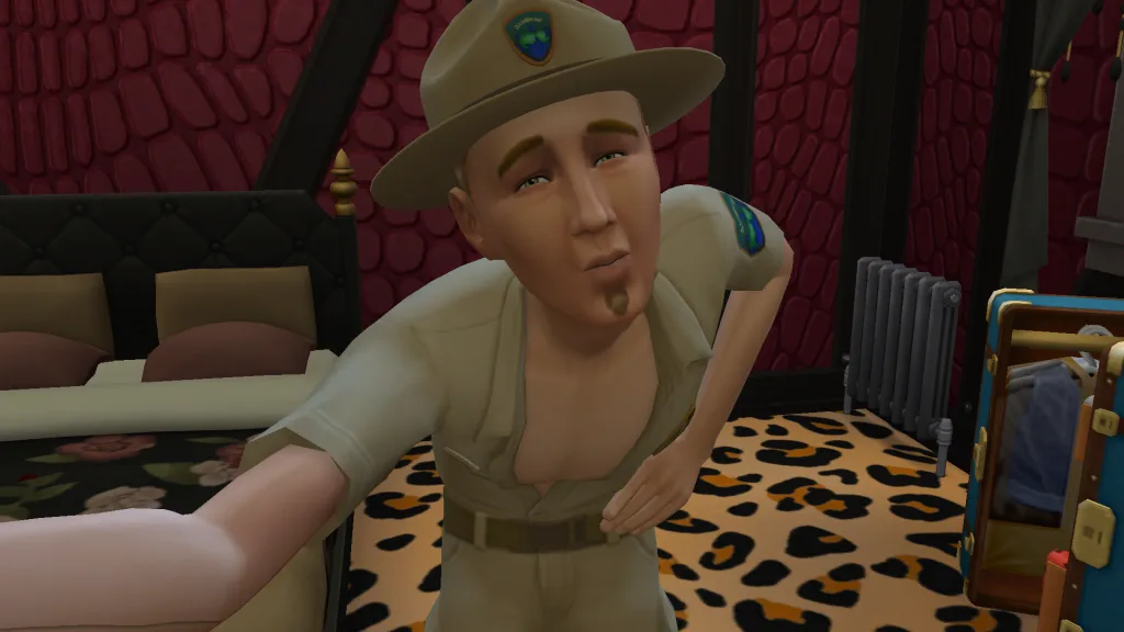 Johnny Zest leaning  over to take a photo while dressed up as an adventurer or scout. It's an all-beige outfit with a hat and open short sleeved shirt.