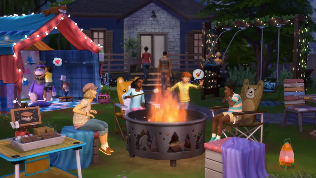 A picture of a group of kids in a backdoor camping ground with a large firepit in front of them.