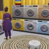 Gramma Hattie Loden in The Sims 4 Buisnesses and Hobbies running a bright and colourful laundromatt with loads of washing machines.
