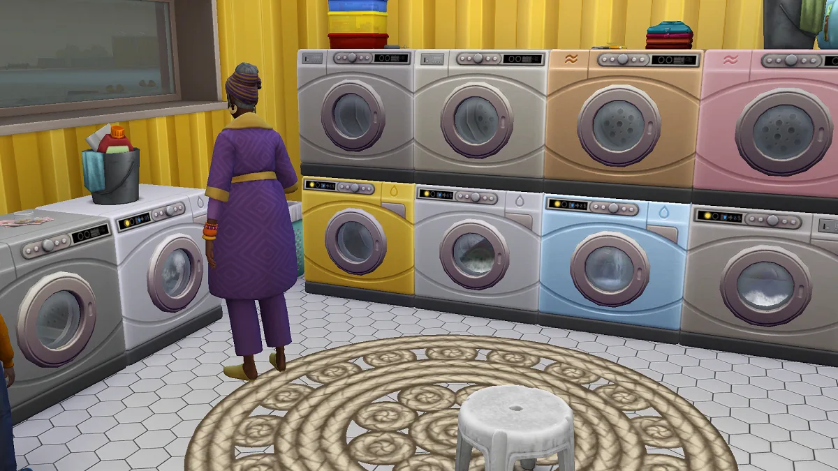Gramma Hattie Loden in The Sims 4 Buisnesses and Hobbies running a bright and colourful laundromatt with loads of washing machines.