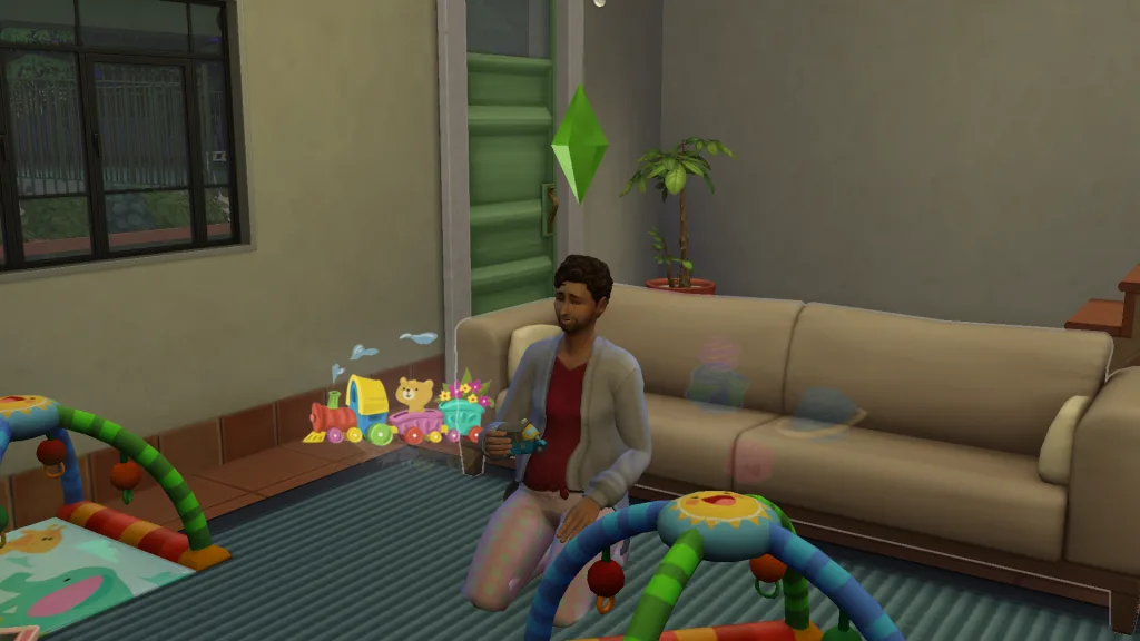 A Young Adult Sim is wearing pajamas playing with children's toys with infant baby matts next to him. He has imagination clouds around his head showing he's doing imaginary play.