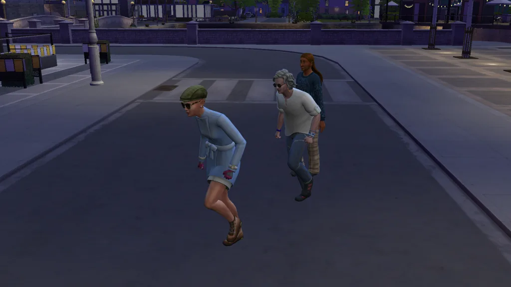 Three Sims angrily crossing the road in The Sims 4 at night. They're wearing a range of different clothes, with two wearing sunflowers. It's an urban area.