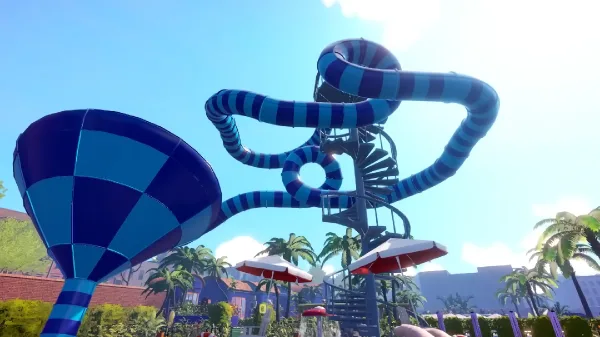 A twisted pipe slide in Waterpark Simulator which is two shades of blue, shot from below.