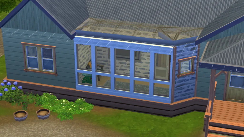 The exterior of a conservatory in The Sims 4, showing wainscoting on the outside, in Gibbi Point.