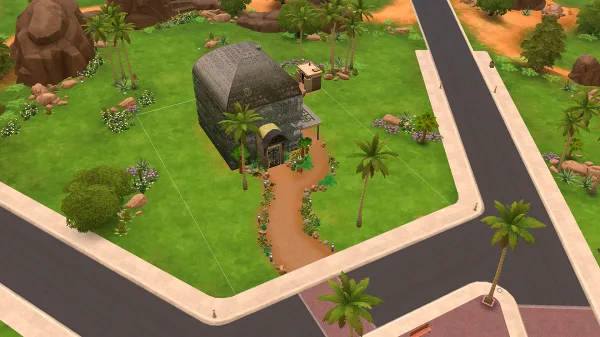 A winter garden in Oasis Springs in The Sims 4, showing glass walls, a glass ceiling, and landscaping.