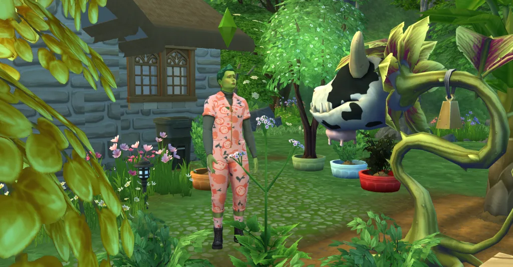 A PlantSim wearing pink and green overalls in a green garden looking sad while talking to a cowplant outside of a stone cottage.