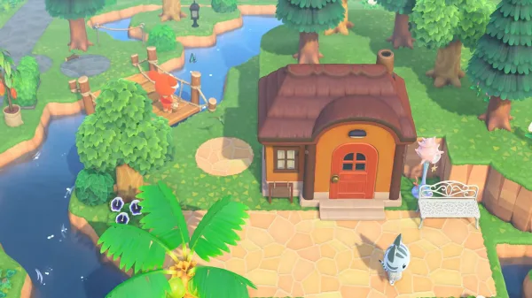 An aerial shot of a colourful tropical island in Animal Crossings: New Horizons, with two villagers wandering around.