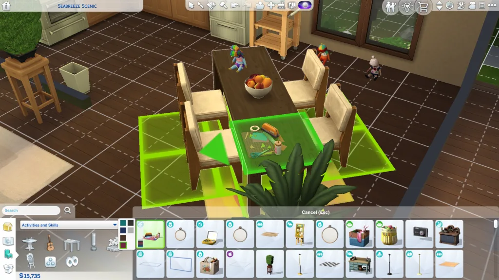 A table in Buy Mode showing a DIY Delight Papercrafting Kit bing placed on a table in The Sims 4: Adventure Awaits. The kitchen is retro and wooden, with dolls, plants, and fruit bowls everywhere.