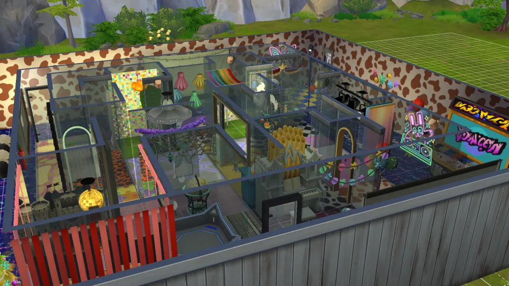 A funhouse in The sims 4 displaying a labyrinth of glass walls, lights, streamers, a pipe organ, decals, games consoles, mirrors, and more.