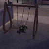Vlad, the grand vampire in The Sims 4: Vampires, playing on a swingset in Ciudad Enamorada from The Sims 4: Lovestruck in the dark.