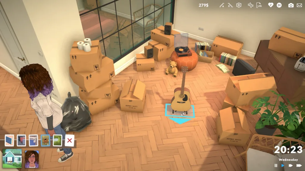 A cluttered room showing a PAra alongside many boxes and music-related interests like a guitar and record deck.