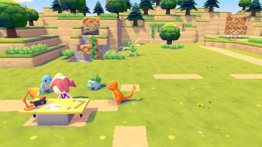 A human Ditto at a workbench in Pokopia with a Squirtle, Bulbasaur, and Charmander next to them.