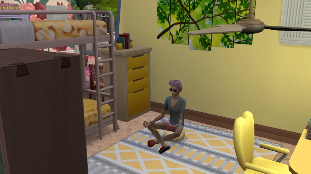 Izzy Fabulous meditating on the floor of a yellow hotel room complete with bunk beds and patterned furniture.